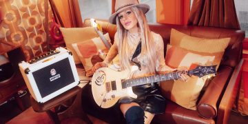 “I wanted a portable amp that I could use backstage before a show to warm up with. I like to plug my PRS right into it – there are no pedals required”: Orianthi and Orange team up to create the 20RT, a portable, versatile amp with high gain tones ap