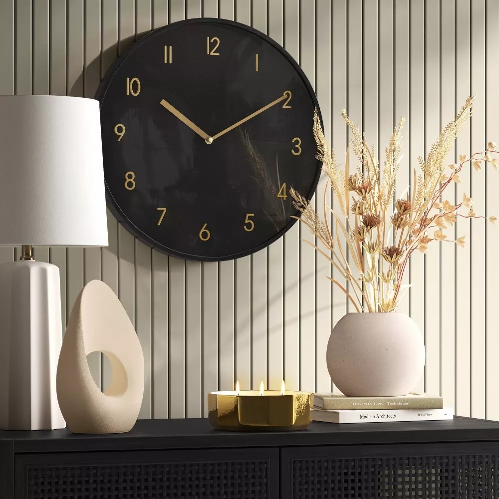 Modern room with a black wall clock.