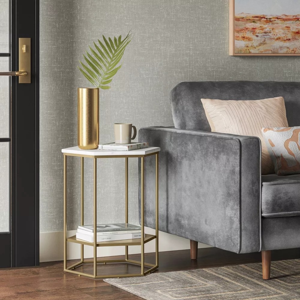 Gold and white side table.