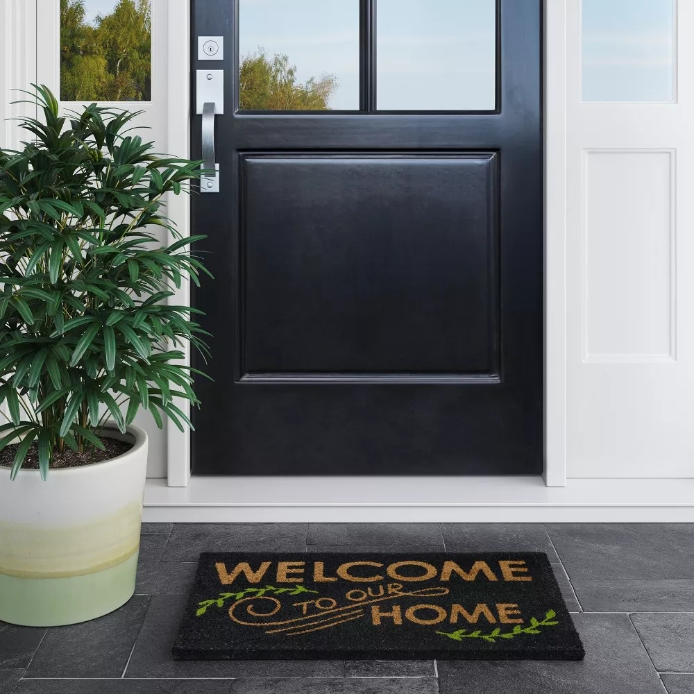 Black doormat with 